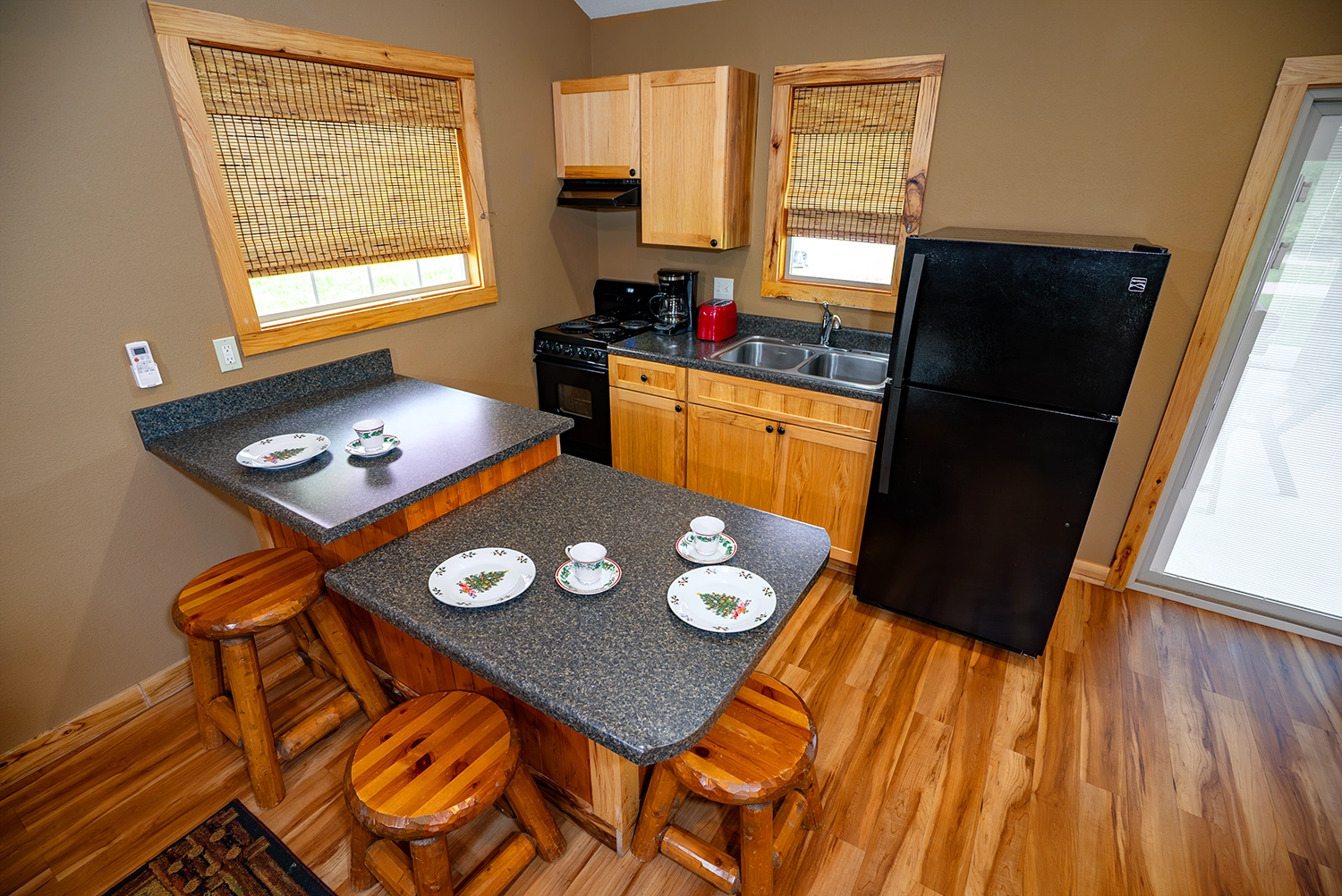 Kitchen of a One-Bedroom Cottage at Santa's Cottages.